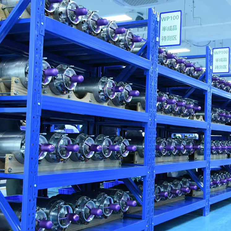 Engine units stored on workshop shelving